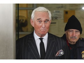 Former campaign adviser for President Donald Trump, Roger Stone, leaves federal court in Washington, Friday, Feb. 1, 2019. Stone was back in court in the special counsel's Russia investigation as prosecutors say they have recovered "voluminous and complex" potential evidence in the case, including financial records, emails and computer hard drives.