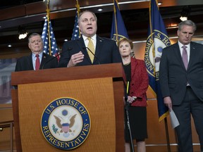 House Minority Whip Steve Scalise, R-La., joined from left by Rep. Tom Cole, R-Okla., Rep. Kay Granger, R-Texas, and House Minority Leader Kevin McCarthy of Calif., as he renewed his criticism of the Democratic leadership for not stripping Rep. Ilhan Omar, D-Minn., from the Foreign Affairs Committee in the wake of anti-semitism accusations, during a news conference at the Capitol in Washington, Wednesday, Feb. 13, 2019.