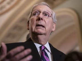 Senate Majority Leader Mitch McConnell, R-Ky., speaks to reporters after a closed-door GOP meeting with Vice President Mike Pence, on Capitol Hill in Washington, Tuesday, Feb. 26, 2019.