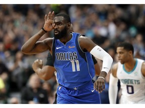 Dallas Mavericks' Tim Hardaway Jr. (11) celebrates sinking a 3-point basket against the Charlotte Hornets during the first half of an NBA basketball game in Dallas, Wednesday, Feb. 6, 2019.