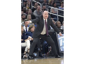 Chicago Bulls head coach Jim Boylen calls out instructions during the first half of an NBA basketball game against the Orlando Magic, Friday, Feb. 22, 2019, in Orlando, Fla.