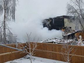 Aftermath of a house explosion is shown in Calgary, Alta., Sunday, Feb.17, 2019 in a handout photo. A house was destroyed when a fire broke out following an apparent explosion in Calgary early Sunday, officials said, and several hours later firefighters were still unable to enter the building to check if anyone was home at the time.