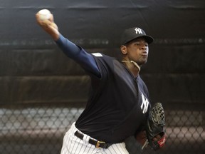 New York Yankees starting pitcher Luis Severino throws in the bullpen at the team's spring training baseball facility, Thursday, Feb. 14, 2019, in Tampa, Fla.