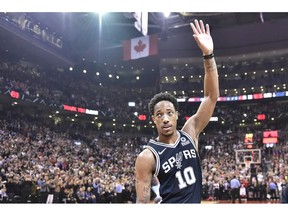 San Antonio Spurs guard DeMar DeRozan (10) acknowledges the fans as he receives a standing ovation during first half NBA basketball action against the Toronto Raptors in Toronto on Friday, Feb. 22, 2019.