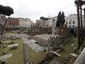 A view of the archeological site of Largo Argentina, in Rome, Monday, Feb. 18, 2019. A complex of ancient temples linked to Julius Caesar's murder will be opened to the public. The below-street-level temple ruins at Largo Argentina in the heart of downtown Rome is visible to pedestrians. But Rome's mayor said Monday by late 2021, walkways will be constructed inside the site so that tourists can stroll through the ruins. Bulgari luxury goods maker is sponsoring the work. The area includes a stone podium that was part of the senate-meeting place where Caesar was slain in 44 B.C.