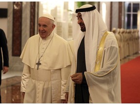 Pope Francis is welcomed by Abu Dhabi's Crown Prince Sheikh Mohammed bin Zayed Al Nahyan, upon his arrival at the Abu Dhabi airport, United Arab Emirates, Sunday, Feb. 3, 2019. Francis travelled to Abu Dhabi to participate in a conference on interreligious dialogue sponsored the Emirates-based Muslim Council of Elders, an initiative that seeks to counter religious fanaticism by promoting a moderate brand of Islam.