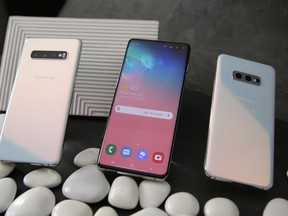 In this Tuesday, Feb. 19, 2019, photo from left are the new Samsung Galaxy S10, the S10+ and the S10e during a product preview in San Francisco.