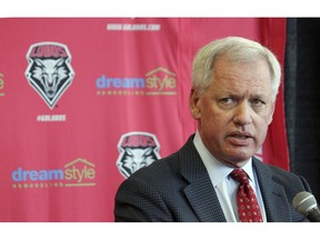 FILE - In this May 3, 2017, file photo, then-University of New Mexico athletics director Paul Krebs answers questions during a news conference in Albuquerque, N.M. Krebs has been charged with fraud and money laundering. The New Mexico Attorney General's Office filed a criminal complaint Wednesday, Feb. 6, 2019, against Krebs in connection with a 2015 golf trip to Scotland and allegations he tried to conceal a $25,000 donation.