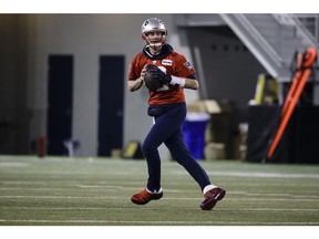 New England Patriots quarterback Tom Brady looks to pass during NFL football practice, Friday, Feb. 1, 2019, in Atlanta, as the team prepares for Super Bowl 53 against the Los Angeles Rams.