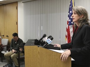 Hawaii Attorney General Clare Connors speaks during a news conference, Tuesday, Feb. 12, 2019 in Honolulu. Connors has asked the state's highest court to immediately suspend Honolulu's top prosecutor Keith Kaneshiro because he is the target of a federal investigation.