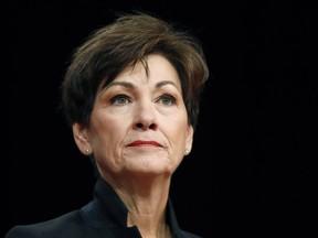 FILE - In this Jan. 18, 2018, file photo, Iowa Gov. Kim Reynolds delivers her inaugural address in Des Moines, Iowa. Nearly 50 years after Iowa moved to reduce partisanship in its court system, Republicans who control the governor's office and the Legislature say it's time to give politicians greater control.