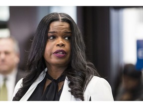 Cook County State's Attorney Kim Foxx speaks to reporters at the Leighton Criminal Courthouse after R. Kelly was ordered held on a $1 million bond, Saturday, Feb. 23, 2019 in Chicago.  Cook County Judge John Fitzgerald Lyke Jr. has set Kelly's bond at $1 million saying that the amount equals $250,000 for each of the four people he's charged with sexually abusing.