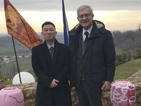 This March 20, 2018 photo provided on Jan. 3, 2019 by Italian senator Valentino Perin, shows the senator, right, posing for a photo with then North Korean diplomat Jo Song Gil on the occasion of a cultural event with the Veneto region at a restaurant in San Pietro di Felletto, near Treviso, northern Italy.