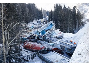 A train derailment is shown near Field, B.C., Monday, Feb. 4, 2019. A union representative says a Canadian Pacific freight train fell more than 60 metres from a bridge near the Alberta-British Columbia boundary in a derailment that killed three crew members. The westbound freight jumped the tracks Monday at about 1 a.m. near Field, B.C.