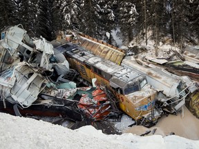 A train derailment is shown near Field, B.C., Monday, Feb. 4, 2019. Investigators say a Canadian Pacific freight train was parked and began to move on its own before it derailed and killed three crew members on the Alberta-British Columbia boundary.