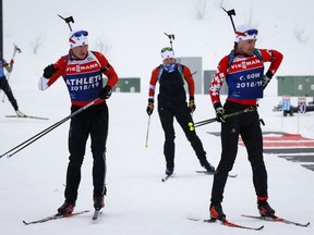 Christian Gow, right, Scott Gow, left, and Rosanna Crawford, train at the Canmore Nordic Centre in Canmore, Alta., Friday, Feb. 1, 2019. Canada's biathlon team gets a rare chance to race at home in a World Cup starting Thursday in Canmore, Alta. The last World Cup held at the Canmore Nordic Centre in 2016 was the largest biathlon event there since the 1988 Winter Olympics.