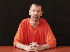 Captive British journalist John Cantlie speaks in this still image taken from an undated video published on the internet by Al-Furqan, the media arm of the Islamic State group.