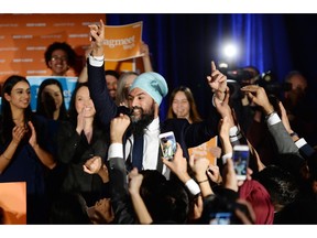 NDP leader Jagmeet Singh celebrates his Burnaby South byelection win as he arrives at his election night party in Burnaby, B.C., Monday, Feb. 25, 2019.