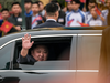 Kim Jong-Un waves from his car after arriving by train at Dong Dang railway station near the border with China on Feb. 26, 2019 in Lang Son, Vietnam.