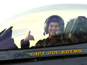 U.S. Air Force Capt. Zoe  Kotnik, F-16 Viper Demonstration Team  commander and pilot, smiles after a certification flight at Joint Base Langley-Eustis, Va., Jan. 29, 2019. Kotnik performed more than 30 practice missions before the certification.