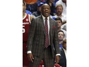 Arkansas coach Mike Anderson shouts to his team during the first half of an NCAA college basketball game against Kentucky in Lexington, Ky., Tuesday, Feb. 26, 2019.