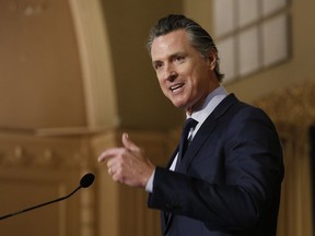 FILE - In this Jan. 17, 2019 file photo, Gov. Gavin Newsom speaks at the California Legislative Black Caucus Martin Luther King Jr., Breakfast, in Sacramento, Calif. Newsom is withdrawing several hundred National Guard troops from the nation's southern border and changing their mission.
