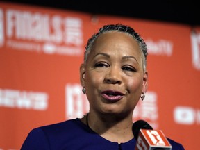 FILE - In this Sept. 7, 2018, file photo, then WNBA president Lisa Borders addresses media members before Game 1 of the WNBA basketball finals between the Seattle Storm and the Washington Mystics in Seattle. Borders, former president of the WNBA, who was named the head of Time's Up last year, says she has resigned as president and CEO of Time's Up, the gender equality initiative formed in 2018 in response to sexual misconduct allegations in Hollywood. Borders says in statement Monday, Feb. 18, 2019, that she is stepping aside "with deep regret" due to family issues.