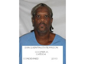 FILE - This undated file photo provided by the California Department of Corrections and Rehabilitation shows inmate Kevin Cooper. California Gov. Gavin Newsom has ordered DNA testing on all evidence that Cooper says would prove his innocence in his 35-year-old murder case that has drawn national attention. Newsom on Friday, Feb. 22, 2019, ordered testing of hair, blood, fingernail scrapings from the victims and a green button. Cooper says the testing will show he was framed for the 1983 killings of four people in Chino Hills. (California Department of Corrections and Rehabilitation via AP, File)