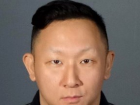 This booking photo released by Los Angeles County Sheriff Department shows Daniel Sohn, who was arrested Friday, Feb 8, 2019, by West Hollywood Sheriff's station deputies in Los Angeles. Sohn, who was recorded antagonizing demonstrators during a Black Lives Matter protest, was arrested on suspicion of impersonating a police officer. (Los Angeles County Sheriff's Department via AP)