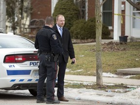 Police on scene at 67 Arbour Glen Crescent where a man died after being wounded by an arrow in London, Ont. on Tuesday February 5, 2019. (Derek Ruttan/The London Free Press)