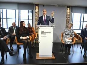 Labour MP Chuka Umunna, center, speaks to the media during a press conference with a group of six other Labour MPs, in London, Monday, Feb. 18, 2019. Seven British lawmakers say they are quitting the main opposition Labour Party over its approach to issues including Brexit and anti-Semitism. Many Labour lawmakers are unhappy with the party's direction under leader Jeremy Corbyn, a veteran socialist who took charge in 2015 with strong grass-roots backing.