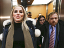 Marcella Zoia, 19, exits a Toronto courthouse with her lawyer Greg Leslie, right, on Feb. 13, 2019..