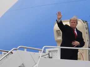 President Donald Trump boards Air Force One as he leaves Andrews Air Force Base, Md., Monday, Feb. 11, 2019, for a trip to El Paso, Texas. Trump will hold his first campaign rally since November's midterm elections in El Paso, as he faces a defining week for his push on the wall -- and for his presidency and his 2020 prospects.