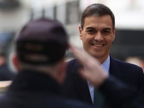 Spain's Prime Minister Pedro Sanchez arrives at the Spanish parliament in Madrid, Wednesday, Feb. 13, 2019. Spain's minority socialist government could be forced to call an early general election if Catalan separatist parties carry out their threat to reject the 2019 national budget in a crucial parliamentary vote Wednesday.