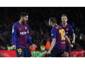 FC Barcelona's Lionel Messi celebrates after scoring during the Spanish La Liga soccer match between FC Barcelona and Valencia at the Camp Nou stadium in Barcelona, Spain, Saturday, Feb. 2, 2019.