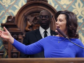 Michigan Gov. Gretchen Whitmer delivers her State of the State address to a joint session of the House and Senate, Tuesday, Feb. 12, 2019, at the state Capitol in Lansing, Mich.