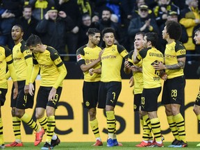 Dortmund celebrates their second goal by Mario Goetze, center, during the German Bundesliga soccer match between Borussia Dortmund and TSG 1899 Hoffenheim in Dortmund, Germany, Saturday, Feb. 9, 2019.