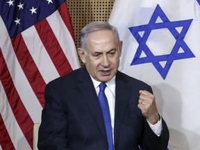 Israeli Prime Minister Benjamin Netanyahu reacts during a bilateral meeting with United States Vice President Mike Pence in Warsaw, Poland, Thursday, Feb. 14, 2019. The Polish capital is host for a two-day international conference on the Middle East, co-organized by Poland and the United States.