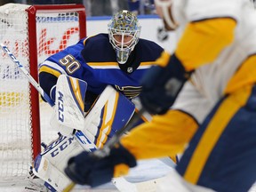 St. Louis Blues' goalie Jordan Binnington (50) defends the goal against the Nashville Predators during the first period of an NHL hockey game Tuesday, Feb. 26, 2019, in St. Louis.