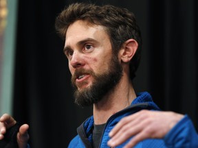 Travis Kauffman responds to questions during a news conference Thursday, Feb. 14, 2019, in Fort Collins, Colo., about his encounter with a mountain lion.