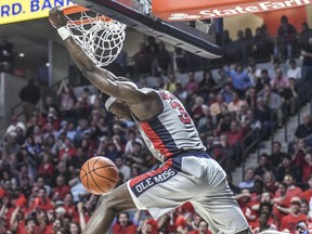 Mississippi guard Terence Davis (3) dunks against Tennessee during the first half of an NCAA college basketball game, Wednesday, Feb. 27, 2019 in Oxford, Miss.
