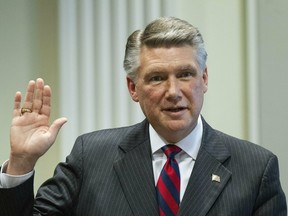 Mark Harris, Republican candidate in North Carolina's 9th Congressional race, prepares to testify during the fourth day of a public evidentiary hearing on the 9th Congressional District voting irregularities investigation Thursday, Feb. 21, 2019, at the North Carolina State Bar in Raleigh, N.C.