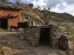 Each year, at least a couple of women die in these huts from exposure, animal bites or smoke inhalation after building fires to stay warm during the Himalayan winter, yet the tradition persists.