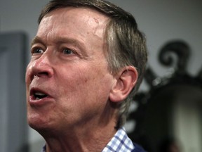 Former Colorado Gov. John Hickenlooper speaks at a campaign house party, Wednesday, Feb. 13, 2019, in Manchester, N.H. Hickenlooper is contemplating a run for the Democratic presidential candidacy.