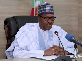 In this photo released by the Nigeria State House, Nigeria's incumbent President Muhammadu Buhari, of the All Progressives Congress party, speaks as he was declared the winner of the just concluded Presidential election in Abuja Wednesday, Feb. 27, 2019. Nigeria's president was declared the clear winner of a second term in Africa's largest democracy early Wednesday, after a campaign in which he urged voters to give him another chance to tackle gaping corruption, widespread insecurity and an economy limping back from a rare recession.