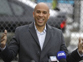U.S. Sen. Cory Booker, D-NJ, speaks during a news conference outside of his home, Friday, Feb. 1, 2019, in Newark, N.J. Booker earlier in the day declared his bid for the presidency with a sweeping call to unite a deeply polarized nation around a "common purpose."