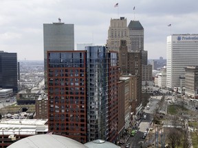 FILE - This April 10, 2018, file photo shows part of the skyline in Newark, N.J. Officials in Newark, which was one of the 18 finalists that Amazon rejected in November when it announced it would split its HQ2 between New York and northern Virginia, sent a giant heart that said "NJ & Newark Still Love U, Amazon!" The love note came despite Amazon saying it's not seeking a new site.