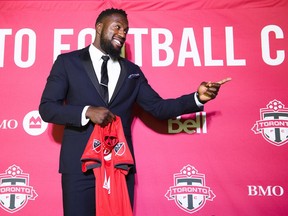 Toronto FC striker Jozy Altidore poses for photographers after speaking to the media after receiving a new long term contract in Toronto on Thursday, February 28, 2019.