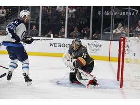 Winnipeg Jets left wing Kyle Connor (81) scores against Vegas Golden Knights goaltender Marc-Andre Fleury (29) during the first period of an NHL hockey game Friday, Feb. 22, 2019, in Las Vegas.