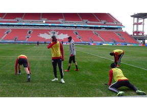 Toronto FC players warm up Monday, Feb.25, 2019 at BMO Field during frigid temperatures ahead of Tuesday's second leg of the CONCACAF Champions League round-of-16 game against Panama's Club Atletico Independiente de la Chorrera.